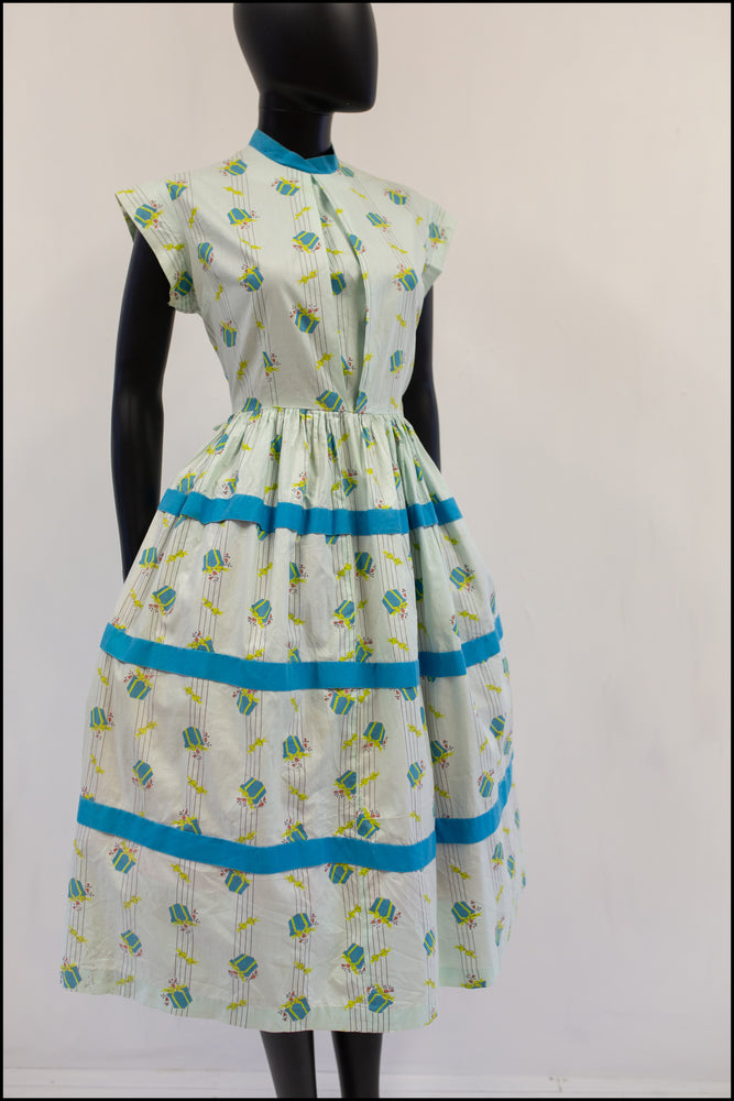 vintage 1950s mint green cotton novelty print dress