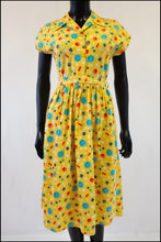 vintage 1940s yellow cotton shirt dress with novelty print