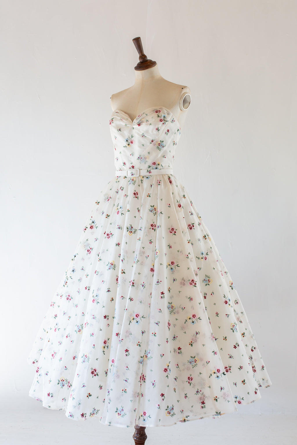 white floral silk embroidered spring wedding dress with full ballerina skirt by Alexandra King
