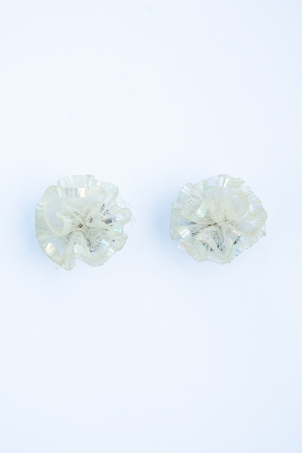 vintage 1940s early plastic iridescent clip on earrings 