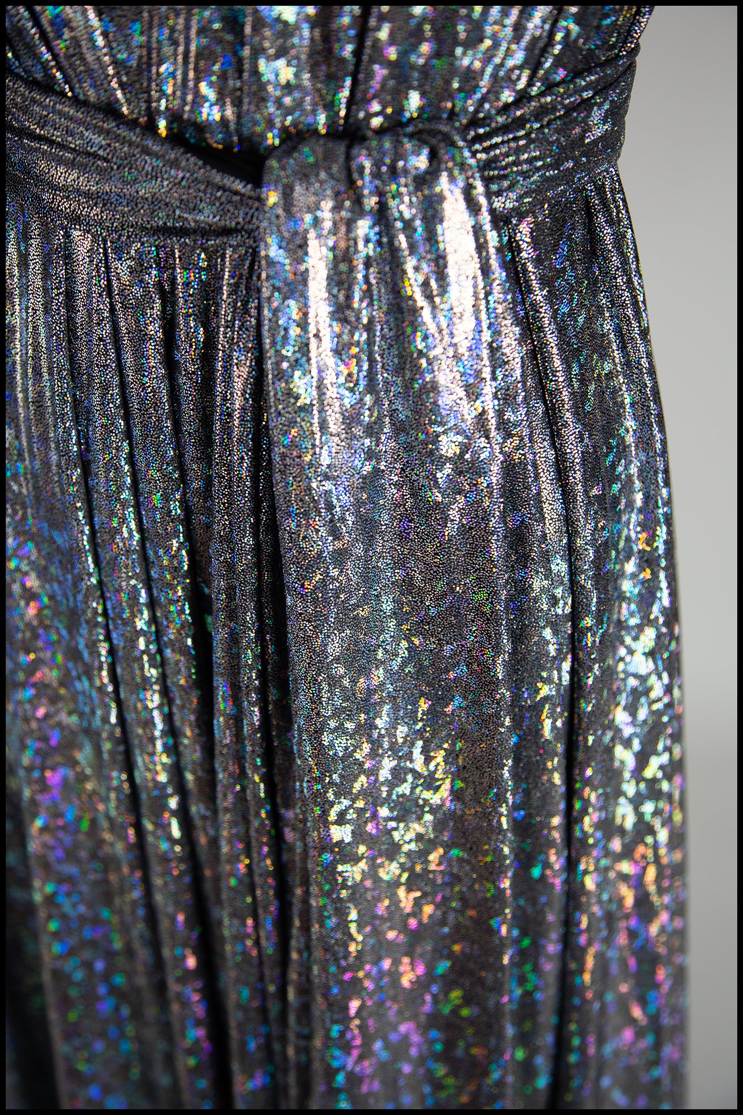 Cher - One Shoulder Silver Holographic Gown