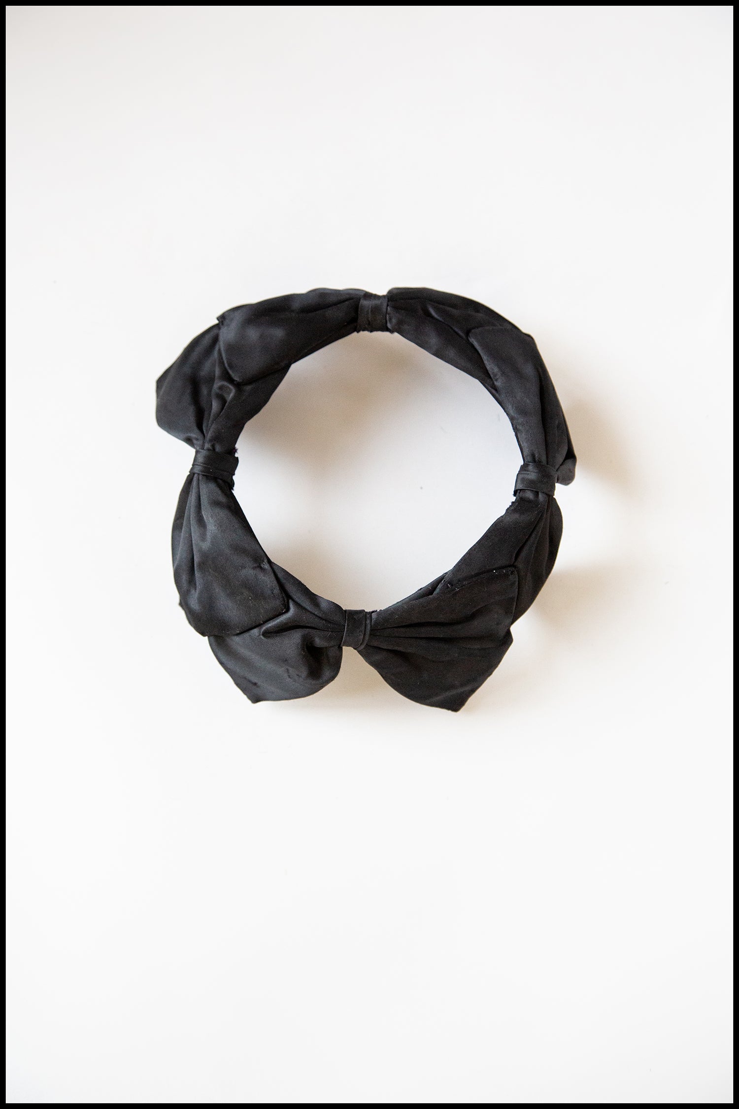 Vintage 1950s Black Satin Bow Crown Fascinator