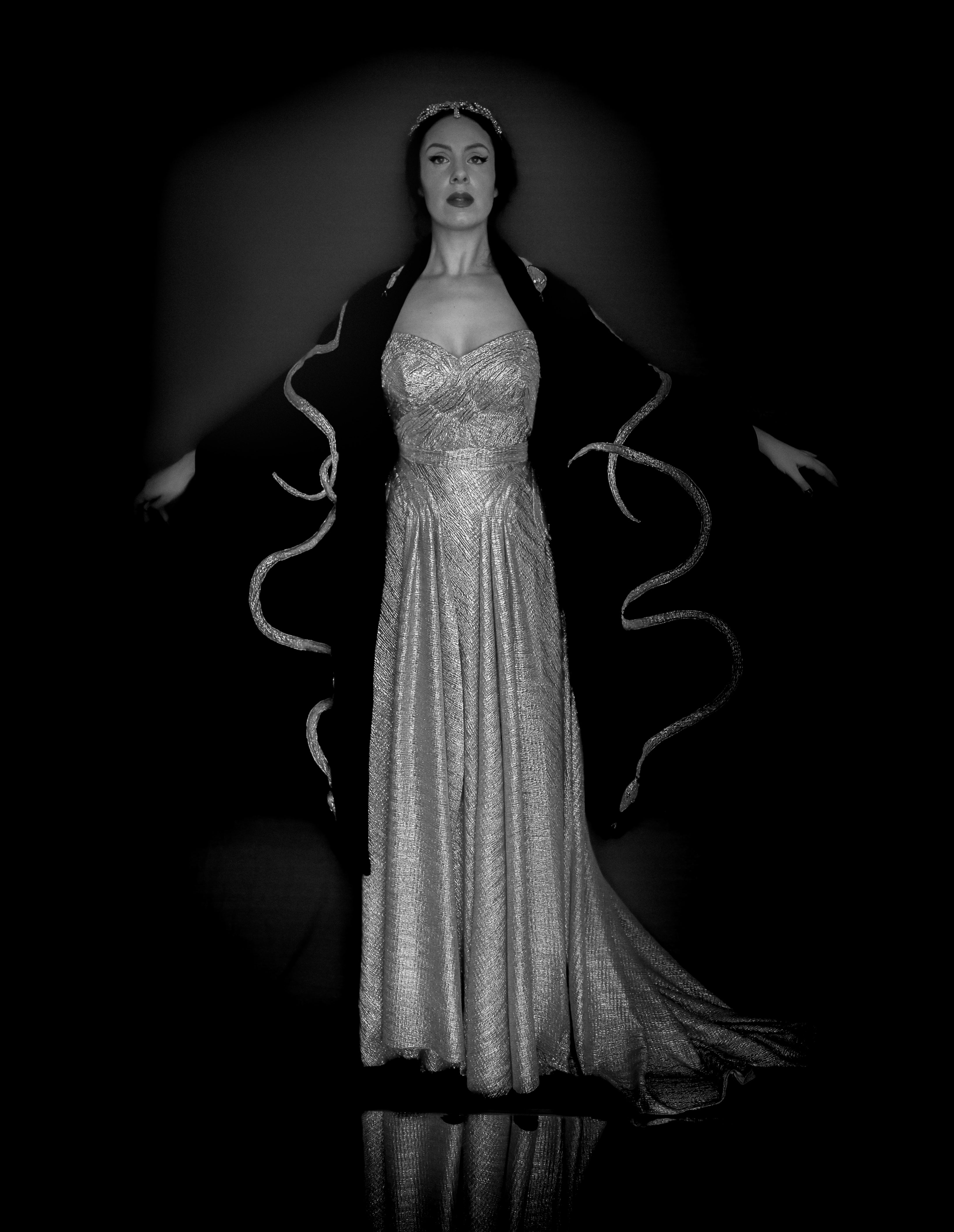 Gold strapless gown in metallic lurex by Alexandra King. Titled the snake charmer, suitable for the red carpet or as a wedding bridal dress. One of a kind hand made in the UK