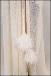 Vamp - Champagne Sequin Feather Trim Gown