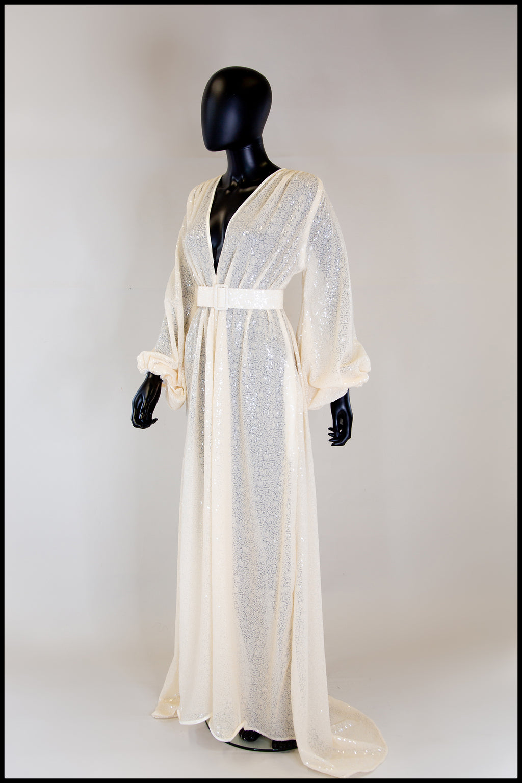 Vamp - Champagne Sequin Feather Trim Gown