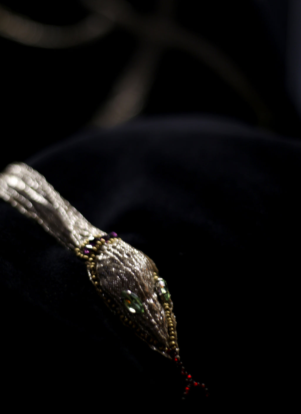 black velvet wrap stole with gold lurex and Swarovski crystal snake design. A one of a kind piece by Alexandra King. The snake charmer wrap. 