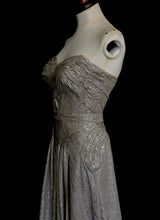Gold strapless gown in metallic lurex by Alexandra King. Titled the snake charmer, suitable for the red carpet or as a wedding bridal dress. One of a kind hand made in the UK