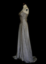 Gold strapless gown in metallic lurex by Alexandra King. Titled the snake charmer, suitable for the red carpet or as a wedding bridal dress. One of a kind hand made in the UK