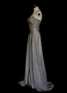 Gold strapless gown in metallic lurex by Alexandra King. Titled the snake charmer, suitable for the red carpet or as a wedding bridal dress. One of a kind hand made in the UK