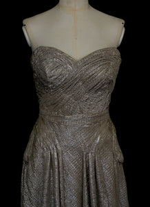 Gold strapless gown in metallic lurex by Alexandra King. Titled the snake charmer, suitable for the red carpet or as a wedding bridal dress. One of a kind hand made in the UK