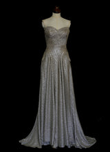 Gold strapless gown in metallic lurex by Alexandra King. Titled the snake charmer, suitable for the red carpet or as a wedding bridal dress. One of a kind hand made in the UK