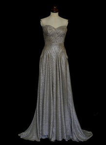 Gold strapless gown in metallic lurex by Alexandra King. Titled the snake charmer, suitable for the red carpet or as a wedding bridal dress. One of a kind hand made in the UK