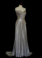 Gold strapless gown in metallic lurex by Alexandra King. Titled the snake charmer, suitable for the red carpet or as a wedding bridal dress. One of a kind hand made in the UK