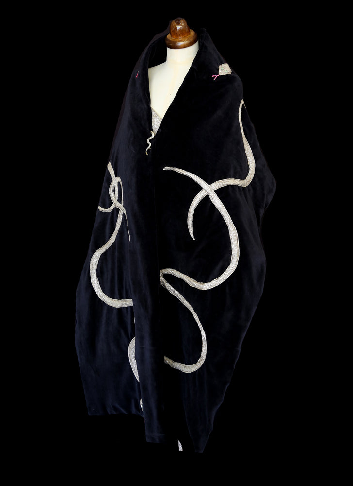 black velvet wrap stole with gold lurex and Swarovski crystal snake design. A one of a kind piece by Alexandra King. The snake charmer wrap. 