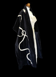 black velvet wrap stole with gold lurex and Swarovski crystal snake design. A one of a kind piece by Alexandra King. The snake charmer wrap. 