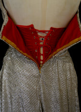 Gold strapless gown in metallic lurex by Alexandra King. Titled the snake charmer, suitable for the red carpet or as a wedding bridal dress. One of a kind hand made in the UK