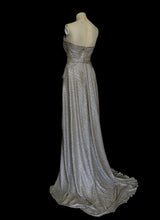 Gold strapless gown in metallic lurex by Alexandra King. Titled the snake charmer, suitable for the red carpet or as a wedding bridal dress. One of a kind hand made in the UK